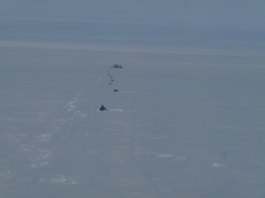 Building the airstrip on the snow.