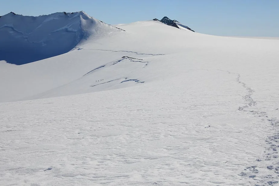 Aerial view of the team crossing the ice.