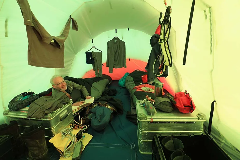 Neil relaxing in the Weatherhaven tent.