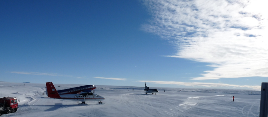 Three very different airplanes on the Troll airfield.