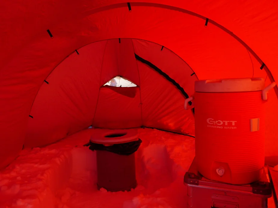 Inside the toilet tent.