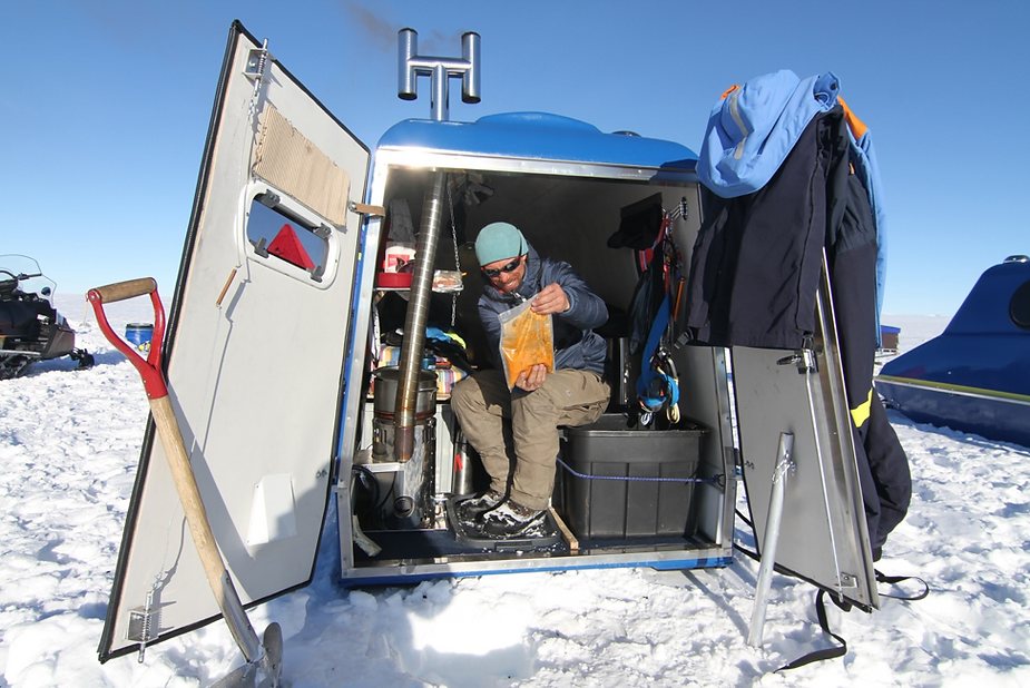 A team member inside their living module.