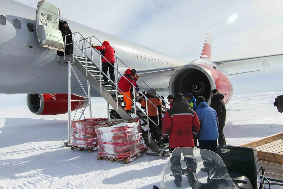 Loading patient onto the plane.