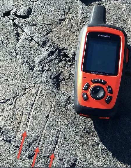 Visible glacial striations.